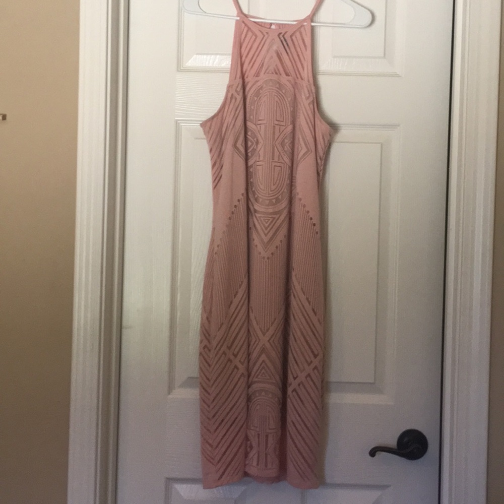 Light pink razor back just above the knee dress